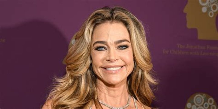Denise Richards rocks a white tank top with shorts for lunch with
