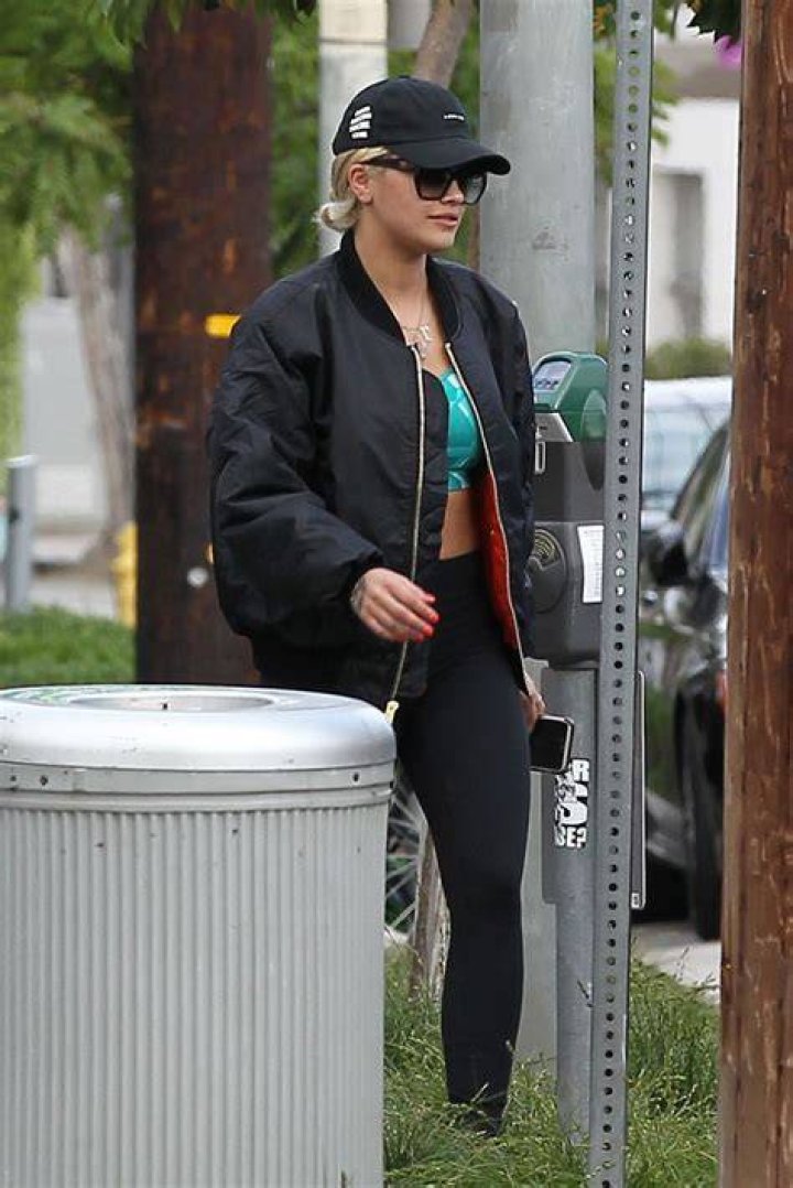 Rita Ora Leaving a coffee shop with her father in Kensington19