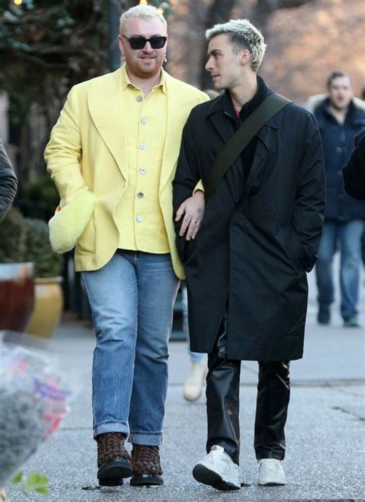 Sam Smith cozies up to new man Francois Rocci in London